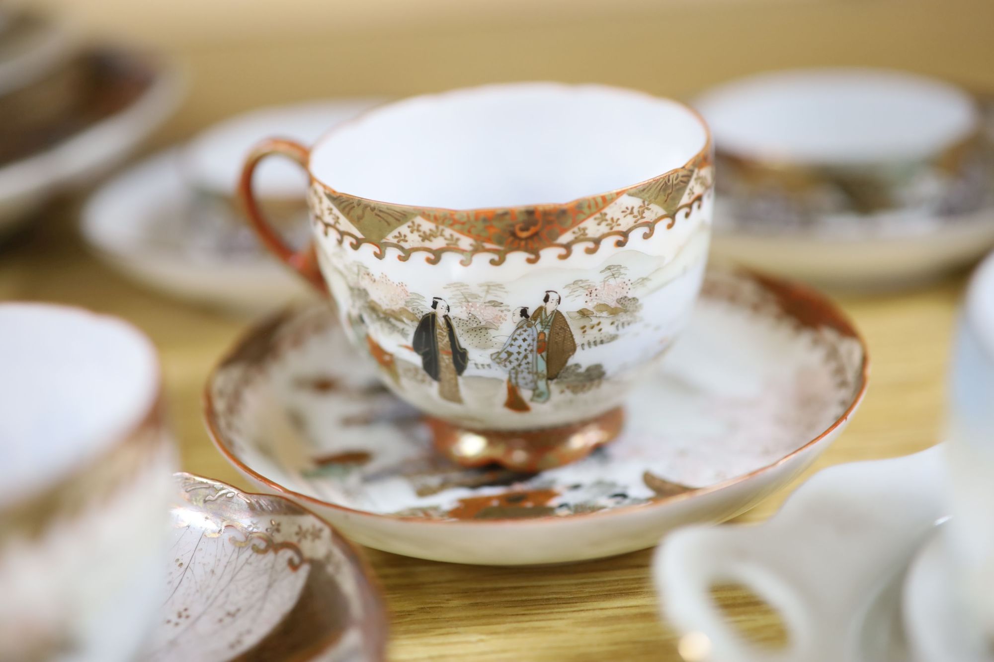 A group of Japanese ceramic teawares and plates, Meiji